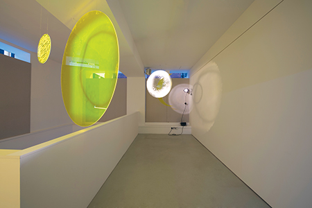 Paul Kneale, 3D lens flare, 2015, Perspex, spray paint, acrylic painting, film light, dimensions variable 